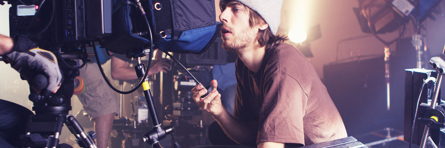 Director behind camera on set