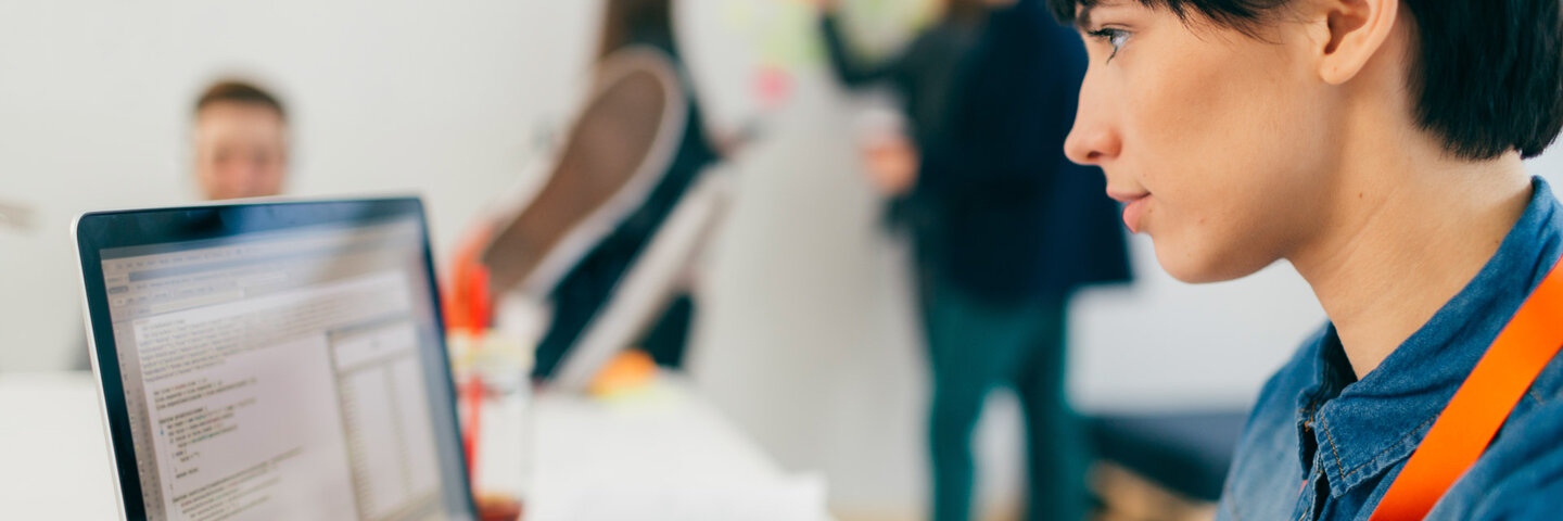 woman typing on keyboard