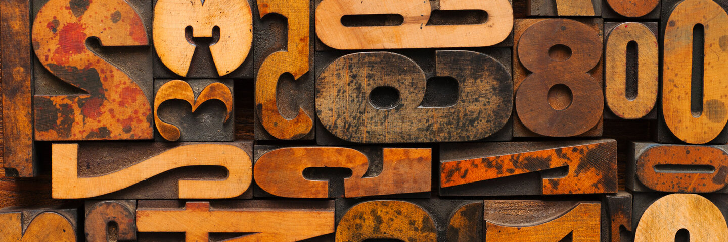 Press blocks of numbers in various typographical styles.