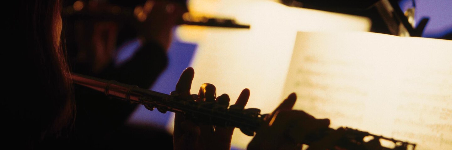flute player in orchestra