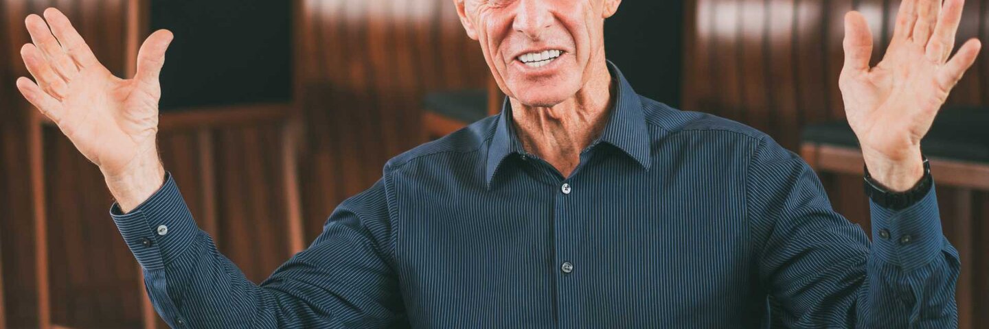 Senior man telling a story