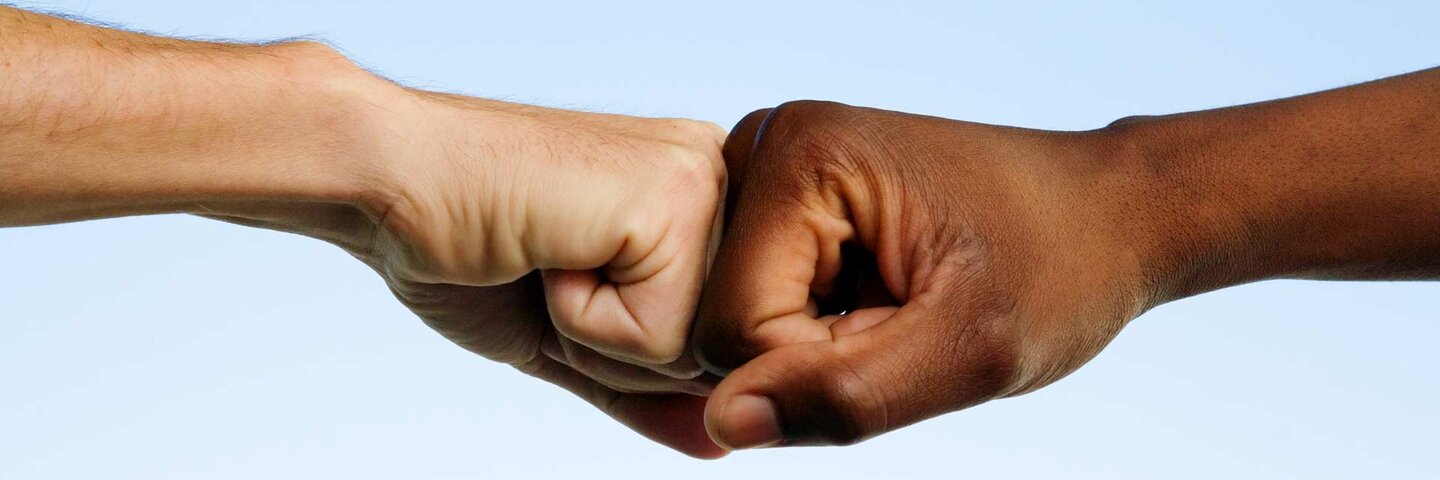 Black and white fists