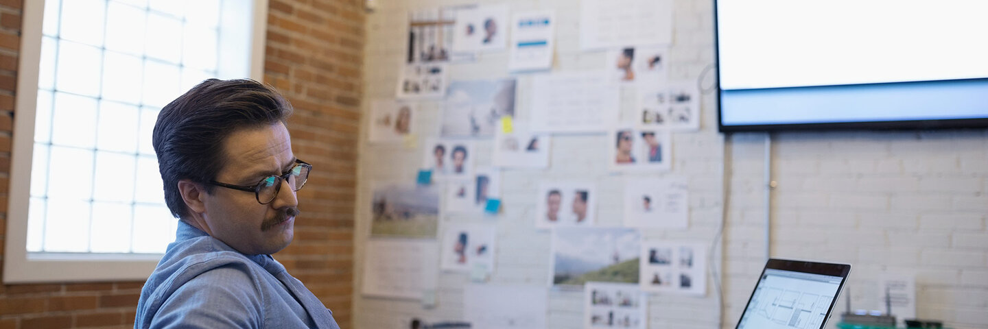 man writing screenplay