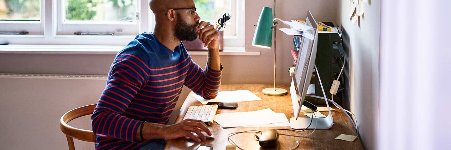 Man working at home on computer