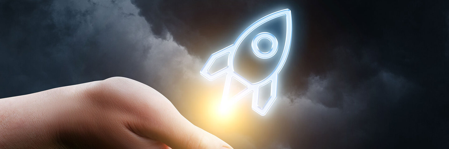 rocket icon launching from a woman's hand