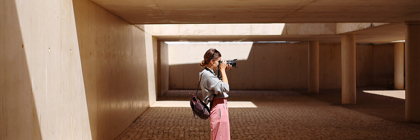 Photographer taking a photo of architecture
