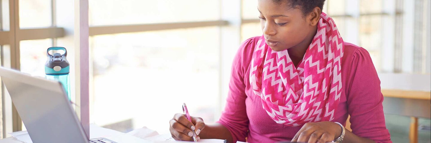 female college student studying