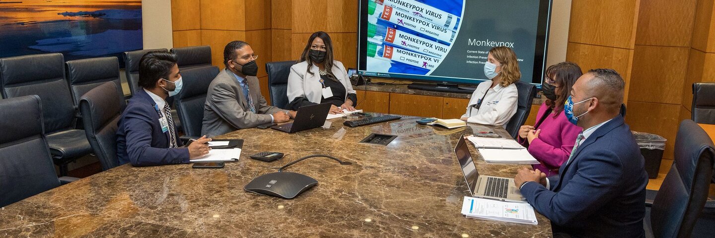 Health professionals in a meeting room